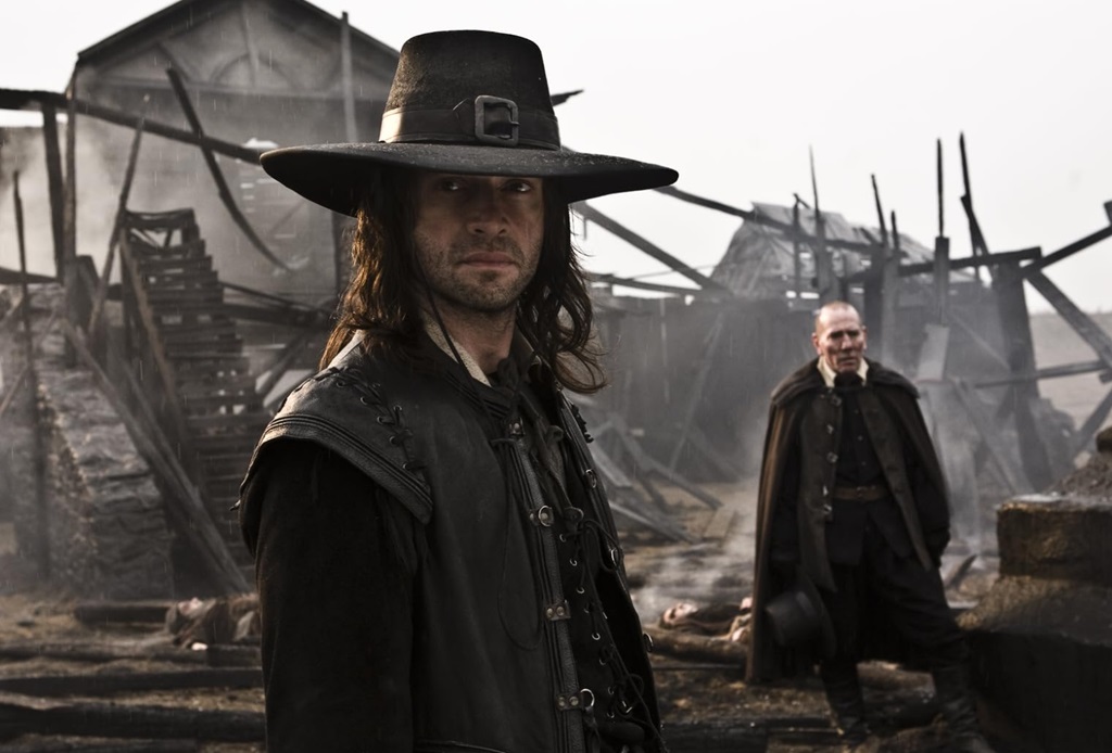 Pete Postlethwaite e James Purefoy in Solomon Kane (2009) Pete Postlethwaite e James Purefoy in Solomon Kane (2009)