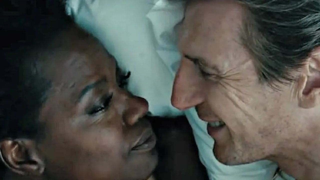 Liam Neeson e Viola Davis in una scena di Widows